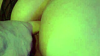 Kinky guy interacts playfully with his partner in a private setting