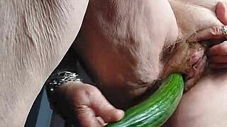 German Granny Fucks Hairy Old Pussy with Cucumber