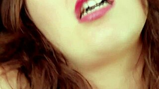 Redhead mom Helena Handbasket plays with a new toy for wild fun.