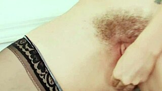 Redhead mom Helena Handbasket plays with a new toy for wild fun.