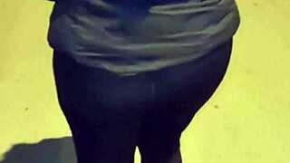 madura streetwalker in transparent leggings flashing her thong