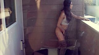 hot teen 18+ fingers her wet pussy on the balcony