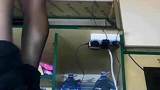 Tracy caught upskirted at work while exercising in skirt