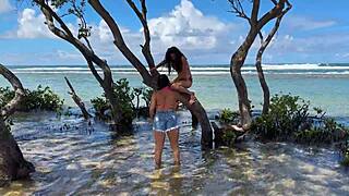 two pretty girls enjoy the beach at enseada dos corais in cabo