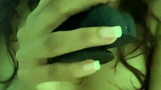 Petite babe masturbates in erotic chair, fucking her pussy