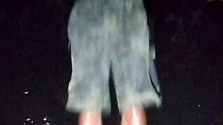 IN THE PARK, A MATURE BEAUTIFUL WOMAN DOES A HOMEMADE PHOTOSHOOT AT THE GYM FOR AN INTERVIEW