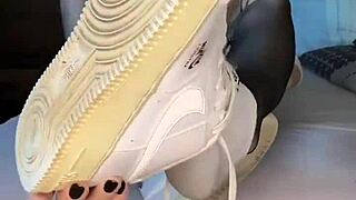 Girl's nylon-clad feet in Nike Air Force ignite fetish desires