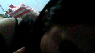 She sucks a fat black cock while her boyfriend watches