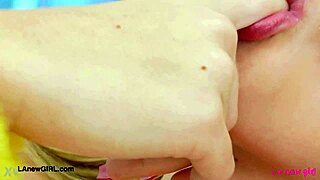 Teen blonde model reveals her sexy body during photoshoot