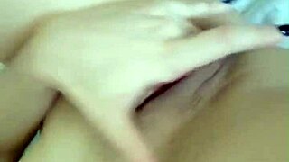 Brunette masturbates her wet pussy with fingers