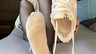 Girl's nylon-clad feet in Nike Air Force ignite fetish desires