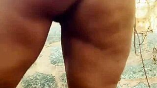 Curvy Ebony BBW Shakes Big Ass and Tits While Masturbating Solo Behind Village House
