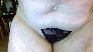 mature woman spreads booty in thong parade