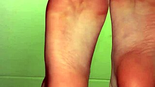 White girl showing her feet in socks for cash payment