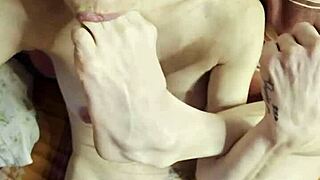 petite beauty sucks cock and toes at the same time