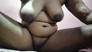 Indian wife shows huge natural tits in homemade play. Watch her tease and touch.