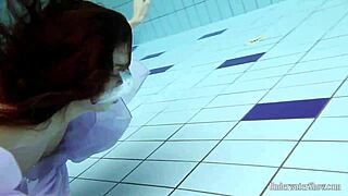 Aneta Flaunts Big Tits in Purple Dress During Pool Dip