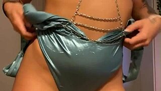 Horny Tattooed Brunette Squirts Wildly While Masturbating with Huge Dildo in Lingerie