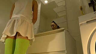Hot Brunette College Girl With Mini Tennis Skirt And Over Knee Socks In Bathroom Shows Panties Under Short Skirt And Goes Also No Panties