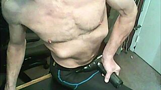 Stretching with massage gun with compression tights and brace bound