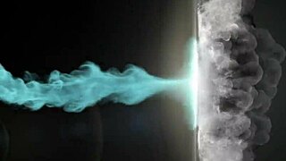 Curly-haired Cleo performs in a pornstar scene