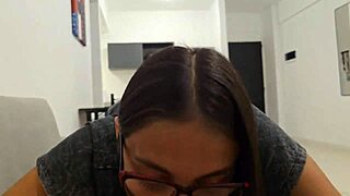 Petite brunette licks interracial cock in kitchen