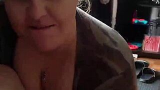 Kandy Kane appears in a casual amateur video as a housewife with big tits.