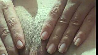 Look at this cute young prostitute with small tits and hairy pussy under her shorts?