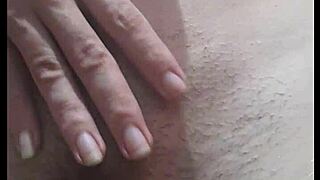 Look at this cute young prostitute with small tits and hairy pussy under her shorts?