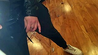 hey, check out this guy playing with his body on a transparent chair in close-up