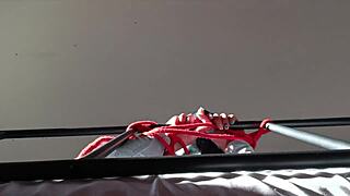 bound in latex and hooded, she takes a big cock deepthroat with moaning and spitting