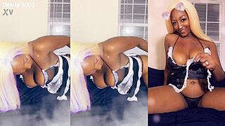 Ebony maid cleans house in thong, showing big pussy and tits.