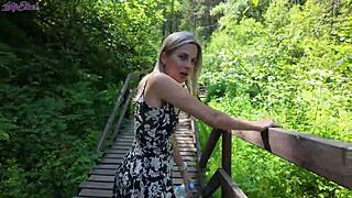 Sweet girl uses remote controlled device in the park.