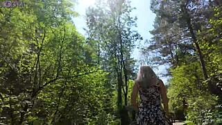 Sweet girl uses remote controlled device in the park.