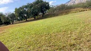 Blonde wife intensely masturbates naked on the football field, exposing her pussy with bold passion