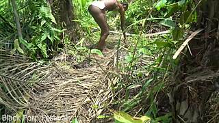 Skinny African woman works outdoors
