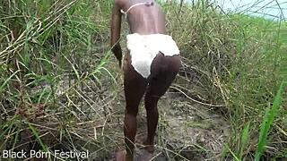 Skinny African woman works outdoors