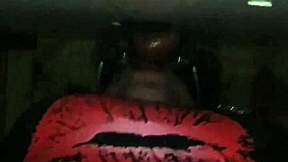 excited person performs deep action on large item through public hole in neutral setting