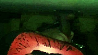 excited person performs deep action on large item through public hole in neutral setting