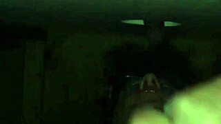 excited person performs deep action on large item through public hole in neutral setting