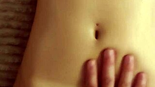 Massaging busty cousin's tits and pussy with masturbation