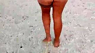 latina amateur exposes tits and ass on mexican beach in lingerie