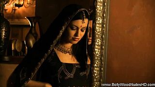 Brunette babe dances seductively, undressing to reveal her naked body in an erotic striptease.