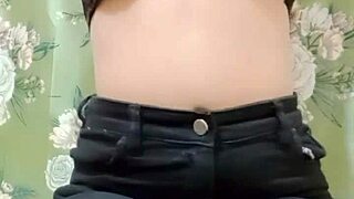 Beautiful Indian girl enjoys fingering her tight pussy at home