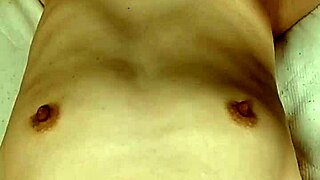 A Japanese amateur housewife exposes herself and asks to be held in a homemade video.