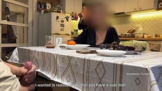 Husband jerking under table in front of step mom in kitchen