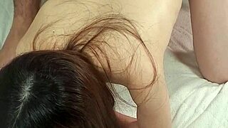 A Japanese amateur housewife exposes herself and asks to be held in a homemade video.