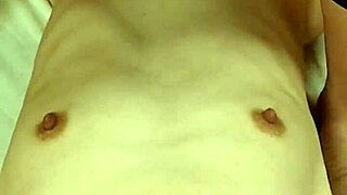 A Japanese amateur housewife exposes herself and asks to be held in a homemade video.