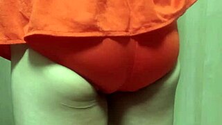 cute girl in swimsuit forced to insert huge anal plug during training