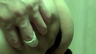 cute girl in swimsuit forced to insert huge anal plug during training